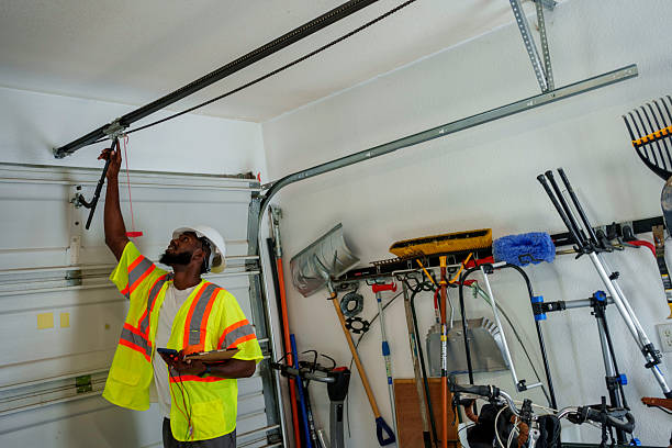 Professional Garage Door Panel Replacement technician working in Jermyn, PA